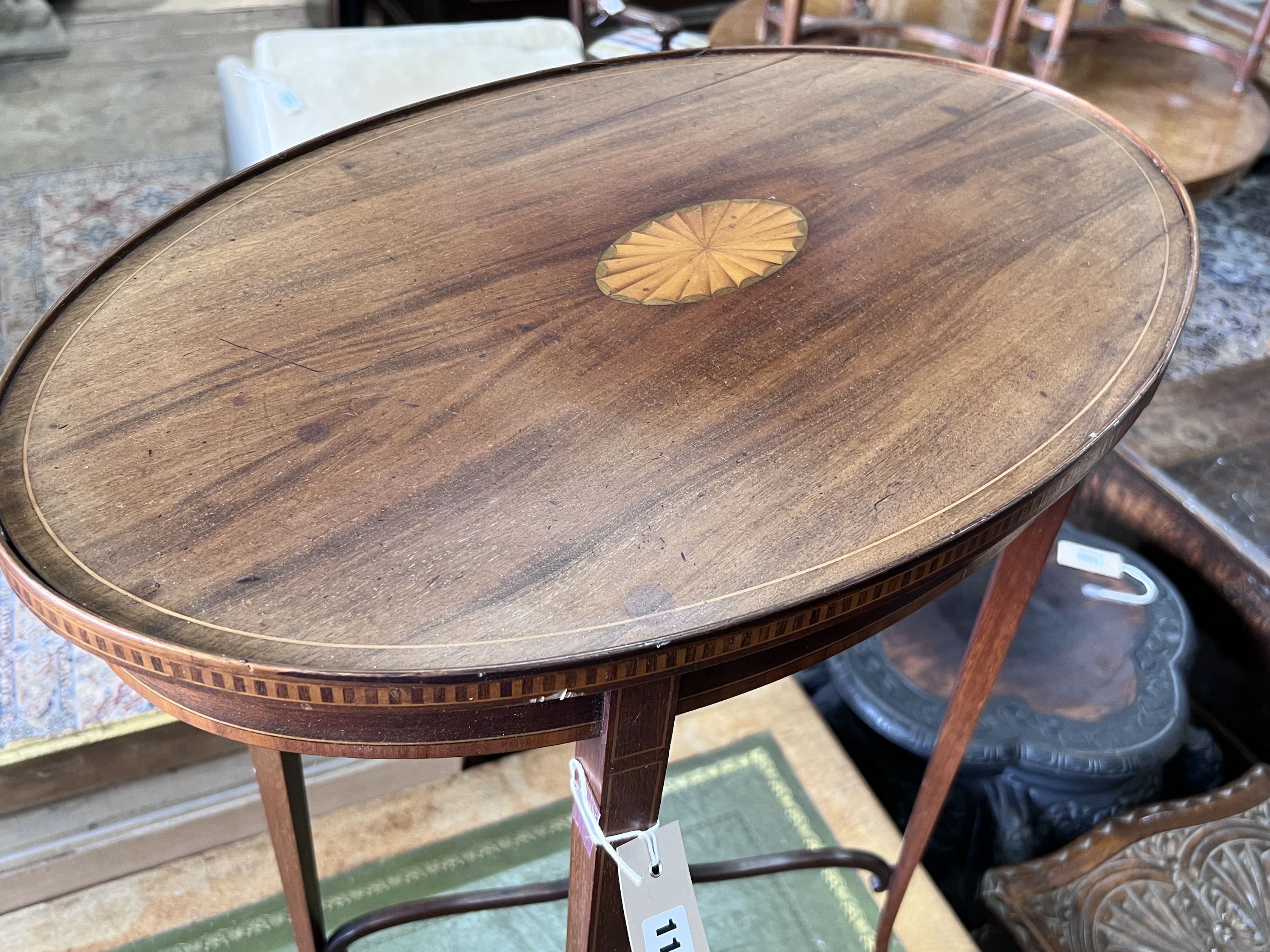 An Edwardian oval inlaid mahogany occasional table, width 61cm, depth 38cm, height 71cm